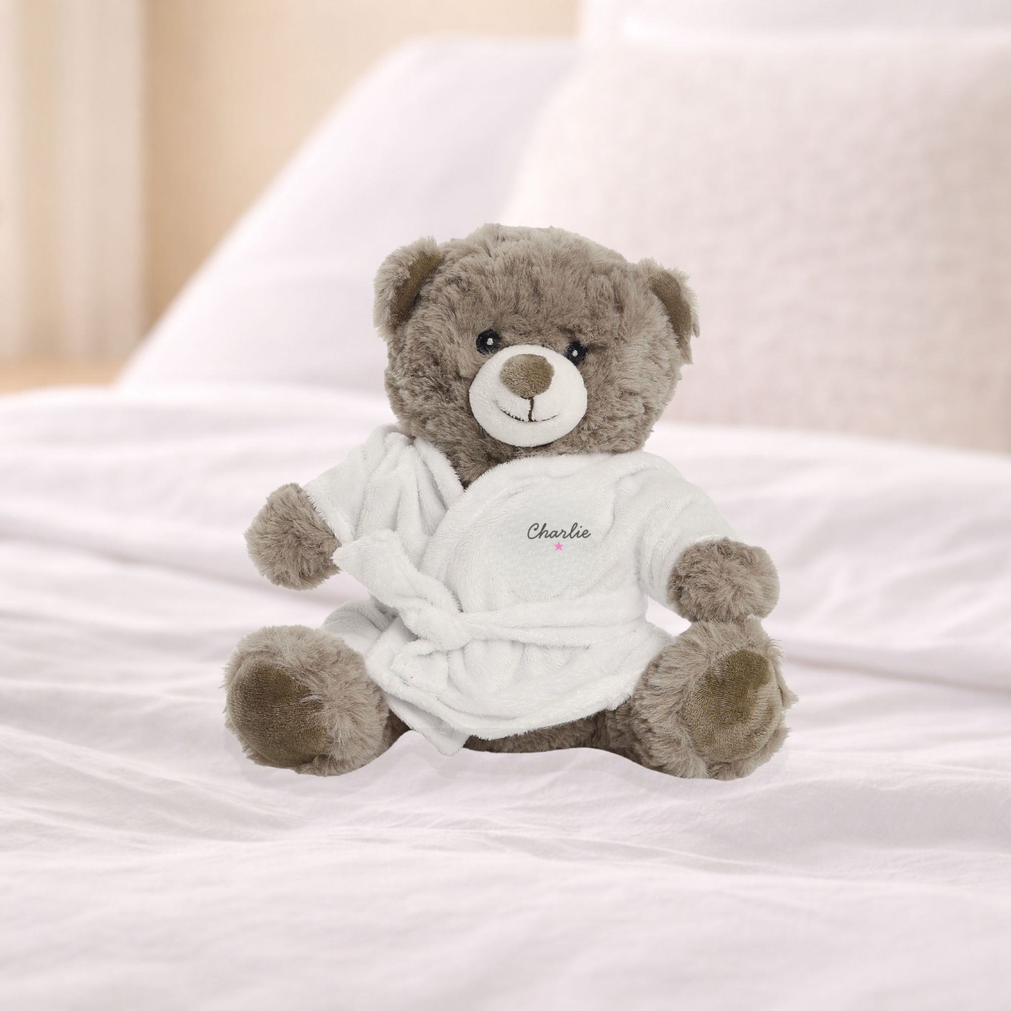 Personalised bedtime teddy bear on a bed for comfort and bedtime routines